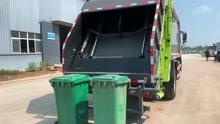 压缩垃圾车挂240升垃圾桶收集垃圾